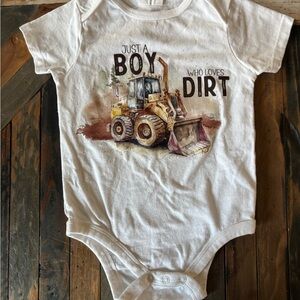 Just a Boy Who Loves Dirt Graphic Onesie